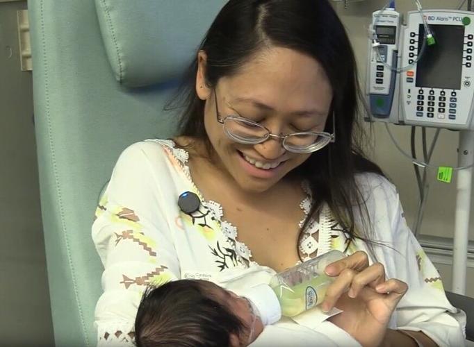 MomHoldingBaby.jpg
